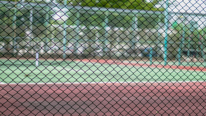 tennis court blur for background.