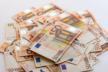Obraz na płótnie Canvas Pile of banknotes of 50 Euro
