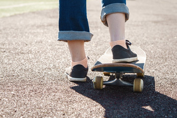 Obraz premium foot sneakers and jeans of a rider before the race
