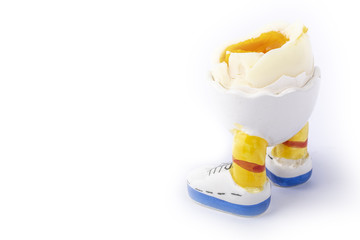 boiled egg open half with legs isolate