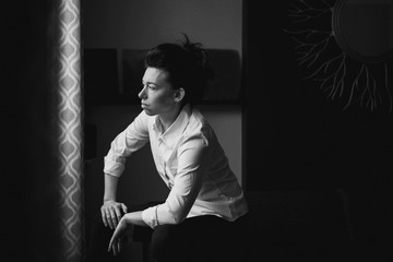 Closeup black and white portrait of beautiful sexy edgy young Caucasian woman. European female with...