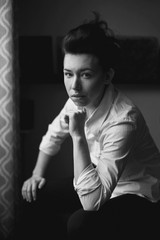 Closeup black and white portrait of beautiful sexy edgy young Caucasian woman. European female with...