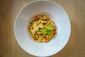 Stir-fried noodles with chicken