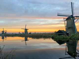 dutch windmill at sunset