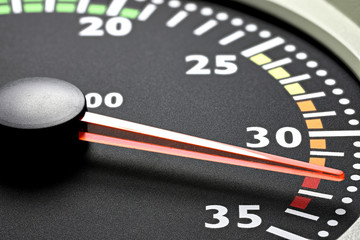 tachometer of a truck in red sphere