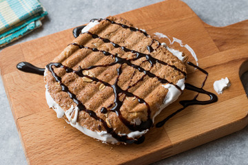 Toasted Marshmallow Sandwich with Chocolate Sauce / Fluffernutter.