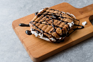 Toasted Marshmallow Sandwich with Chocolate Sauce / Fluffernutter.