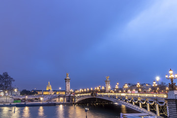 Fototapeta na wymiar Sunset in Paris, with Seine river and Pont Alexandre III