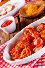 a fresh and tasty sausage in curry sauce