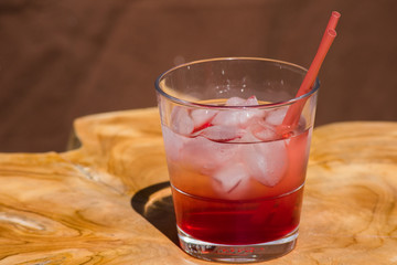 Red Cocktail Lemonade Glass Ice Cubes Straws Isolated Sun Summer Drink Brown Wooden Table