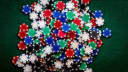 casino chips background on green table