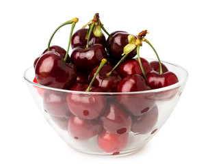 Ripe cherries in glass plate on a white isolated.