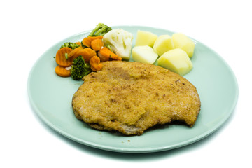 Schnitzel Schweineschnitzel Kartoffeln Gemüse gericht mahlzeit isoliert freigestellt auf weißen Hintergrund, Freisteller 