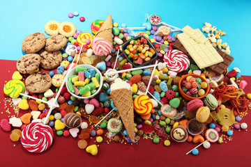 candies with jelly and sugar. colorful array of different childs sweets and treats