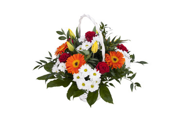 Obraz premium White basket with flowers. A bunch of colorful flowers for a birthday party. Woven basket, roses and tulips.