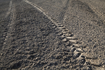 Wheel tracks on the ploughed field