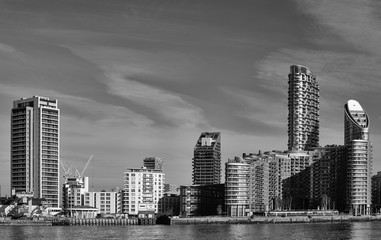 Embankment with skyscrapers in London, Britain. City skyline. Monochrome