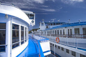Naklejka premium A promenade deck of a passenger vessel moored at the berth