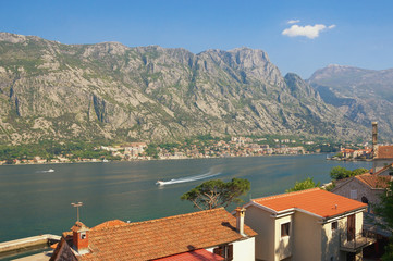 Sunny Mediterranean landscape. Montenegro, view of Bay of Kotor (Adriatic Sea) and red roofs of...