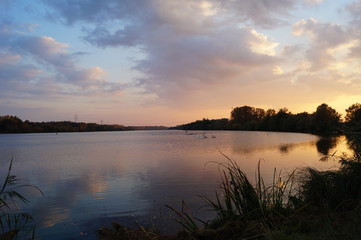 Fototapeta na wymiar crimson sunset over the river Isar