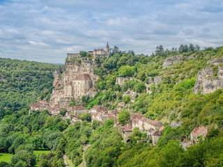 Fototapeta na wymiar Rocamadour, Midi Pyrenees, France - July 27, 2017: Panoramic view of the Rocamadour Monastery and medieval village