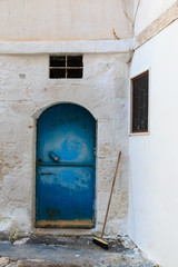 Italy, SE Italy, Ostuni. Narrow, arched old town . Blue Doorways.The "White City."