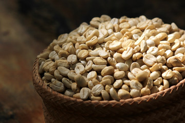 Fototapeta na wymiar fresh coffee beans in wicker basket