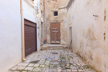 Fototapeta na wymiar Italy, SE Italy, province of Bari, region of Apulia, Monopoli. Cobbled streets.