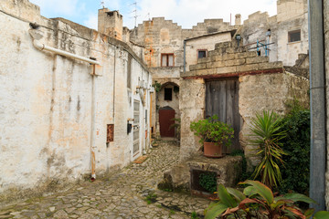 Fototapeta na wymiar Italy, Southern Italy, Region of Basilicata, Province of Matera, Matera. Small cobblestone streets and stairways of the town.