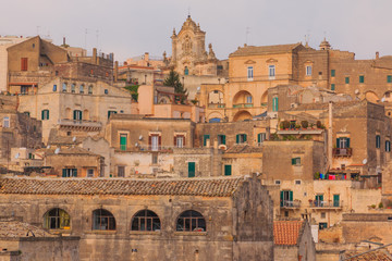 Italy, Southern Italy, Region of Basilicata, Province of Matera, Matera. The town lies in a small canyon carved out by the Gravina. Overview of town.