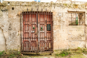 Italy, Southern Italy, Region of Basilicata, Province of Matera, Matera. Iron gated door.