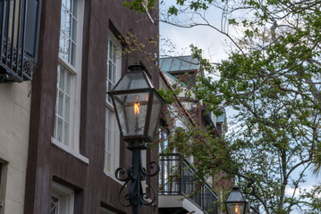 Fototapeta na wymiar Gas Lamp Stands Tall in Early Morning Charleston