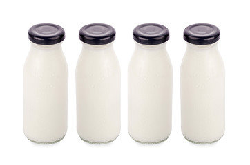 flavor of milk in bottles isolated on white background