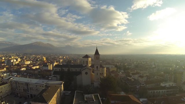 Wide aerial, Cathedral of Avezzano at sunset