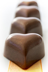 Individual handcrafted chocolate hearts made of organic fair trade chocolate