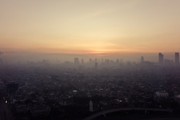 Obraz premium Sunset Behind Jakarta's Skyline