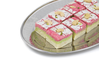 Indian Sweet Dryfruit Barfi Also Know As Cashew barfi, Mithai, barfee, Mawa Barfi, Mava barfi, khoya Burfi Indian Popular Sweet Made up of Coconut, Mawa, Milk and Sugar isolated on white background