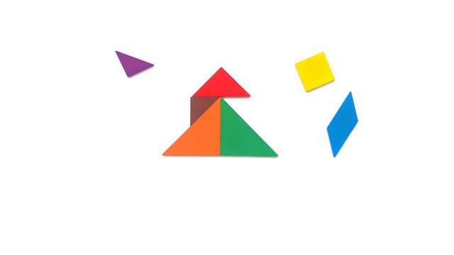 tangram shaped like christmas tree butterfly swallow piegon and angel on white