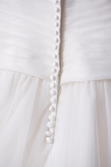 buttons of a silk wedding dress