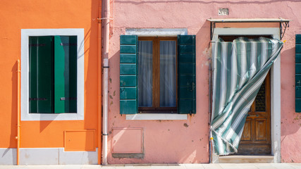 Fototapeta na wymiar Burano, Venezia, Italy. Detailsof the colorful houses in Burano island