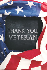 Fototapeta na wymiar Text of thank you, veteran on the chalkboard