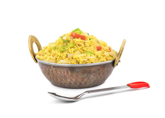 Indian Breakfast Dish Poha Also Know as Pohe or Aalu poha made up of Beaten Rice or Flattened Rice. The rice flakes are lightly fried in oil with mustard, chilly, onion, curry leaves and turmeric
