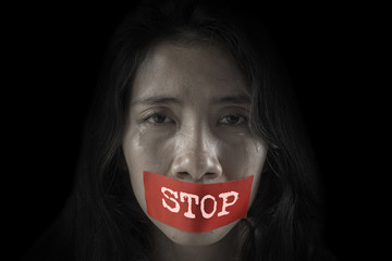 Asian girl crying with stop word
