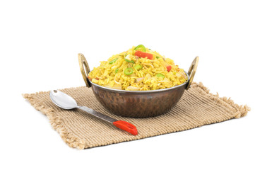 Indian Breakfast Dish Poha Also Know as Pohe or Aalu poha made up of Beaten Rice or Flattened Rice. The rice flakes are lightly fried in oil with mustard, chilly, onion, curry leaves and turmeric