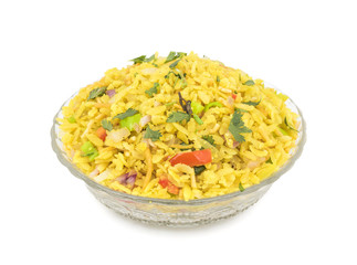 Indian Breakfast Dish Poha Also Know as Pohe or Aalu poha made up of Beaten Rice or Flattened Rice. The rice flakes are lightly fried in oil with mustard, chilly, onion, curry leaves and turmeric