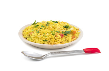 Indian Breakfast Dish Poha Also Know as Pohe or Aalu poha made up of Beaten Rice or Flattened Rice. The rice flakes are lightly fried in oil with mustard, chilly, onion, curry leaves and turmeric