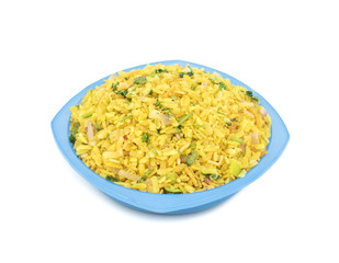 Indian Breakfast Dish Poha Also Know as Pohe or Aalu poha made up of Beaten Rice or Flattened Rice. The rice flakes are lightly fried in oil with mustard, chilly, onion, curry leaves and turmeric