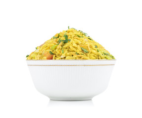 Indian Breakfast Dish Poha Also Know as Pohe or Aalu poha made up of Beaten Rice or Flattened Rice. The rice flakes are lightly fried in oil with mustard, chilly, onion, curry leaves and turmeric