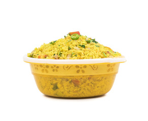 Indian Breakfast Dish Poha Also Know as Pohe or Aalu poha made up of Beaten Rice or Flattened Rice. The rice flakes are lightly fried in oil with mustard, chilly, onion, curry leaves and turmeric