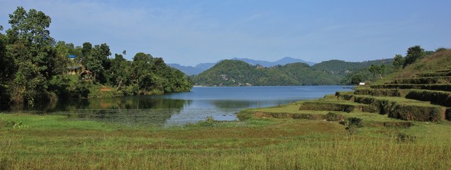 Lake Begnas, terraced fields and forest. Landscape near Pokhara, Nepal.